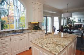 Traditional Style Kitchen With Granite Countertops And A Full Height Granite Backsplas Granite Countertops Kitchen Countertop Design Kitchen Countertops Prices