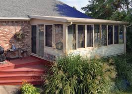 Bridging the gap between indoors and out, a sunroom combines warm natural light and outdoor views with interior comforts. Four Season Rooms Complete Home Construction