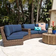 This outdoor sectional sofa from walsunny is equipped with adjustable feet for stability and has a customizable design that can comfortably seat up to six people. Del Sur 2 Piece Curved Sofa Outdoor Wicker Patio Furniture Wicker Patio Furniture Patio Spaces