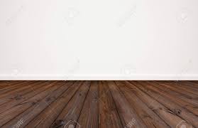 The dark wood floors of this modestly sized but comfortable living room are covered by a natural fiber area rug that lends a nautical feel to the blue and white color pallet. Dark Wood Floor With White Wall Background Stock Photo Picture And Royalty Free Image Image 91027699