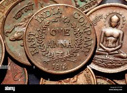 One anna coin hi-res stock photography ...