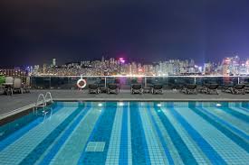 An Outdoor Swimming Pool At Hotel Icon Hong Kong Hotels Hotel Pool