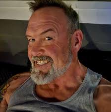 ESPN apologized Monday night for a video clip of a woman baring her breast  that was shown during the Sugar Bowl in New Orleans.