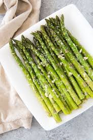 Oven Roasted Asparagus With Garlic Parmesan Lemon Is A Quick And Easy Side Dish Th Oven Roasted Asparagus Asparagus Recipes Roasted Asparagus Recipes Baked