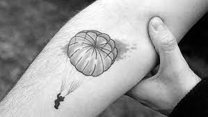 2 tattoos tagged 'parachute' include hot pics view private pics → view by: 30 Parachute Tattoo Designs For Men Sky Diving Ink Ideas