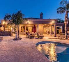 An Entertainer S Dream Home This Home S Huge Backyard Features Patios The Entire Length Of The House A Built In Bbq Sparkl Huge Backyard Built In Bbq Patios