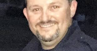 Officer saves man who drove into river