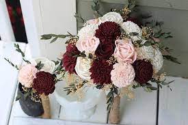 Just make the color of ivory into any elements of you wedding, such as ivory flowers in wedding cakes, table decorations and bouquets, ivory cakes and ivory candles. Burgundy Blush Pink Ivory Sola Wood Budget Wedding Bouquet Set Solaflowerstore