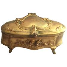 Calibré is a jewelry term used to define stones that a precisely cut for a specific design. Antique Metal Jewelry Box 19 For Sale On 1stdibs