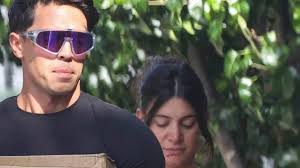 Any day now! 'Hot' Wiggle John Pearce and his heavily pregnant wife Jessie  move boxes into their Sydney home in the final days before their first  child's arrival