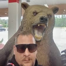 Should drive-through exits be yield or stop signs to ensure traffic safety?