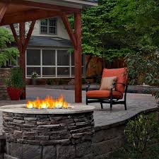 This home depot guide gives fireplace design ideas for your the right stone fireplace with a chimney could be the focal point of an outdoor living space or the pizza oven component for the perfect outdoor kitchen. Outdoor Patio Fireplace Archadeck Outdoor Living