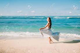 Check out our pretty ocean photos selection for the very best in unique or custom, handmade pieces from did you scroll all this way to get facts about pretty ocean photos? Pretty Woman Posing In Blue Dress At Ocean Beach Stock Photo Picture And Royalty Free Image Image 112633884