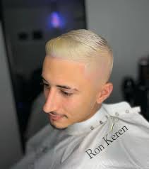 K'orner מספרת גברים ואקדמיה לעיצוב שיער by רון קרן