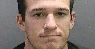 Ex-Marine accused of putting grenade in checked baggage at airport