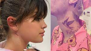 Selena gomez just got a neck tattoo of her new album name rare—check out the pics here. Selena Gomez Slammed For Being Obsessed With Justin Bieber After Revealing New Neck Tattoo Youtube