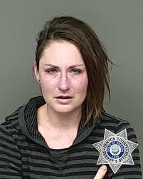 North Albany woman charged with second-degree assault in chisel incident