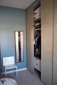 These doors are not as easy to install as the. Before After Hiding The Great Wall Of Clothes Panel Curtains Ikea Panel Curtains Exposed Closet