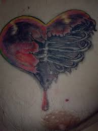 If you're planning on getting a rib cage tattooed to showcase your fantastic upper body rib cage tattoo, then it's important that you get a good design. But Doesn T The Rib Cage Protect The Heart Ugliest Tattoos Funny Tattoos Bad Tattoos Horrible Tattoos Tattoo Fail
