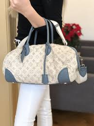 The most common trunks of the era were round, which weren't ideal for toting and storing. Louis Vuitton Monogram Denim Speedy Round Blue Luxury Bags