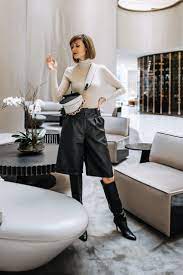 Styling Leather Shorts For Winter And Beyond Leather Shorts Outfit Leather Shorts Leather Boots Outfit