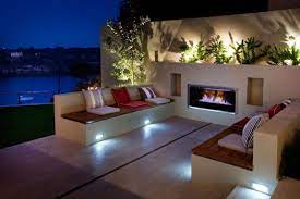 This Outdoor Room With Modern Fireplace Would Be Better Without The Weird L Modern Outdoor Fireplace Contemporary Outdoor Fireplaces Outdoor Fireplace Designs