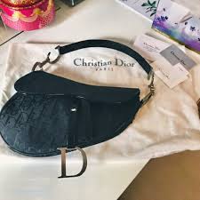 The inspiration can be seen in the graphic design with the now iconic asymmetrical flap that is reminiscent of a saddle shape. Dior Saddle Bag Luxury Bags Wallets On Carousell