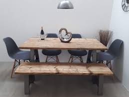 The rustic barnwood dining table timber frame design #3 appears as though it has been transported through time from abraham lincoln's farmhouse to be dropped in your dining room. The Howden Reclaimed Wood Dining Table With Optional Bench Features Industrial Style A Frame Legs To Give A Modern Contrast To The Rustic Wood Top Fitted Your Way