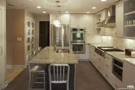modern galley kitchen with island sink