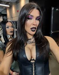 Cathy Kelley dressed as Rhea Ripley for Halloween