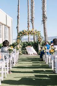 Sunflower Ceremony Arch At The Portofino Hotel In Redondo Beach California Sunflower Wedding Sunflower Wedding Bouquet Ceremony Backdrop