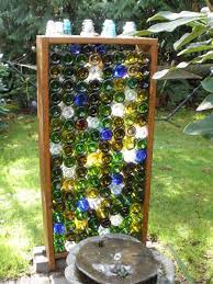 How to build a glass bottle garden wall. Glass Wine Bottle Garden Wall Wine Bottle Wall Wine Bottle Garden Wine Bottle Fence