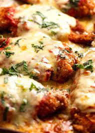 In a shallow bowl, combine the bread crumbs, parmesan cheese and basil. Chicken Parmigiana Recipetin Eats