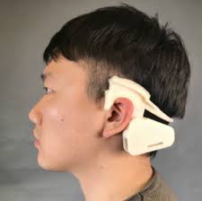 Poster: Auracle --- A Wearable Device for Detecting and Monitoring Eating  Behavior