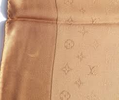 Shirred elastic cuffs and a gathered body are crafted from pure camilla silk to make a statement layering piece. Sold Louis Vuitton Monaco Monogram Tan Camel Beige Shine Silk Square Encore Resale Com