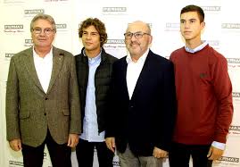 The Lujan brothers in the company of authorities