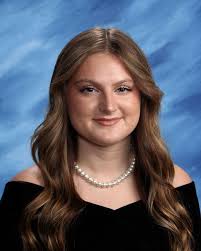 Our shoulders are just bit taller as we stand very proud of the "little  girl" who volunteered and fostered when she was at Doe Elementary School.  She still helps us as much