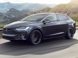 The tesla model x is midsize at best and its third row and cargo space are cramped compared to some used 2016 tesla model x options. 2021 Tesla Model X Review Pricing And Specs