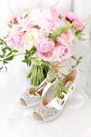 The Bride S Gorgeous Badgley Mischka Shoes Beside Her Bridal Bouquet Of Light Pink Peony Light Pink Sweet White Spray Roses White Ranunculus Blue Delphinium