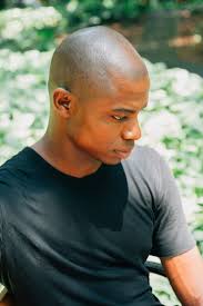 Bald black man Images