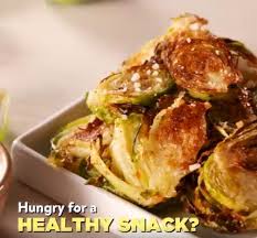 Snack Smarter With These Garlic Parmesan Brussels Sprout Chips Recipe Brussel Sprout Chips Brussel Sprouts Recipes
