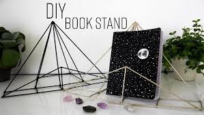 You'll need a few materials to make this planter umbrella stand. Awesome Diy Book Stands For Book Lovers With Tired Hands