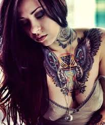 Top 20 most beautiful chest tattoos for women and girls Feminine Chest Tattoos Inked Magazine Tattoo Ideas Artists And Models
