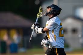 Who were the top boys lacrosse goals leaders at the end of the 2021 season? 