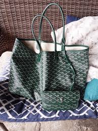 One side is canvas and the other side is grained. Like New Goyard Green L Tote With Attached Wallet One Owner Goyard Bag Goyard Bags Handbags Fancy Bags