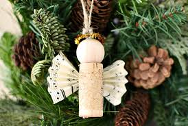 The cute little angel just went down to find a shell to present as a gift. Diy Wine Cork Angel Christmas Ornaments