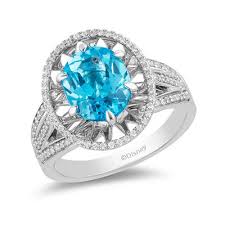 Enchanted Disney Aladdin Oval Swiss Blue Topaz And 1 4 Ct T W Diamond Frame Split Shank Ring In Sterling Silver