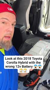 Look at this 2018 Toyota Corolla Hybrid with the wrong 12v Battery 😱😱🫣🫣 