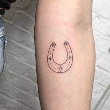 Minimal Horseshoe Tattoo Inked On The Left Forearm Horse Shoe Tattoo Hand Poked Tattoo Friend Tattoos