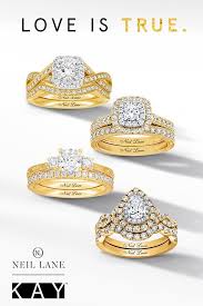 We Re Loving The Gold Wedding Dress Trend A Yellow Gold Diamond Engagement Ring And Band From Neil Yellow Gold Diamond Engagement Ring Engagement Kay Jewelry